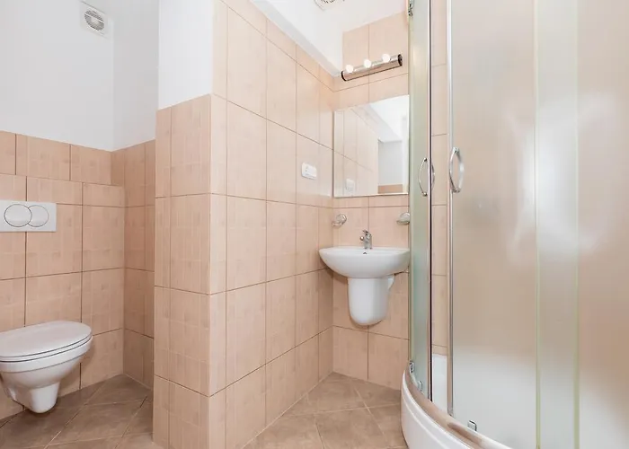 Quarto em Acomodações Particulares Goscinne Rekin *